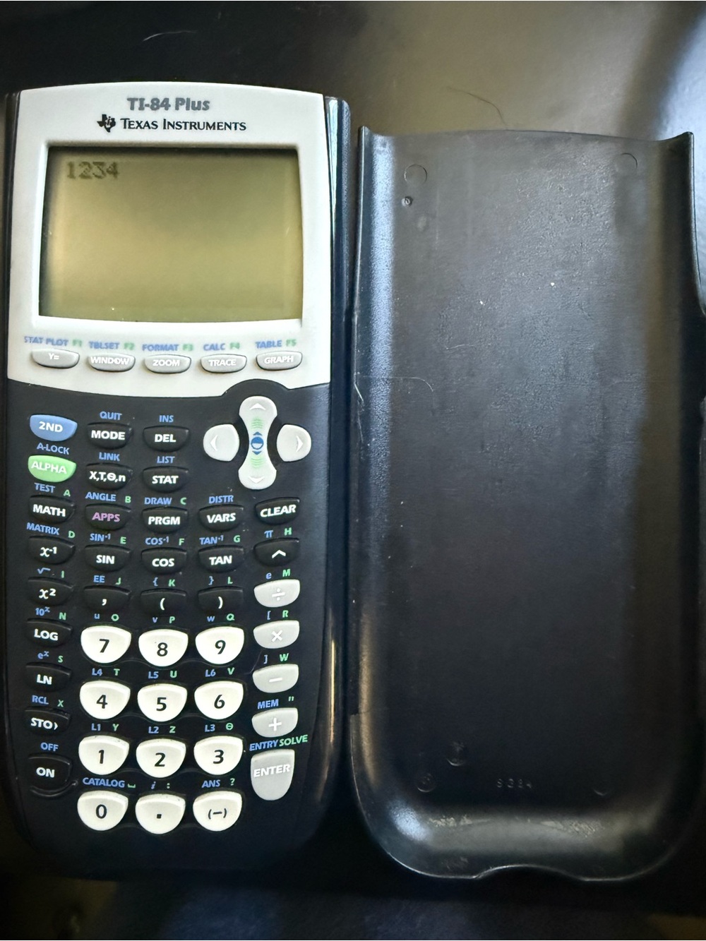 Texas Instruments TI-84 Plus Graphing Calculator in Black and White